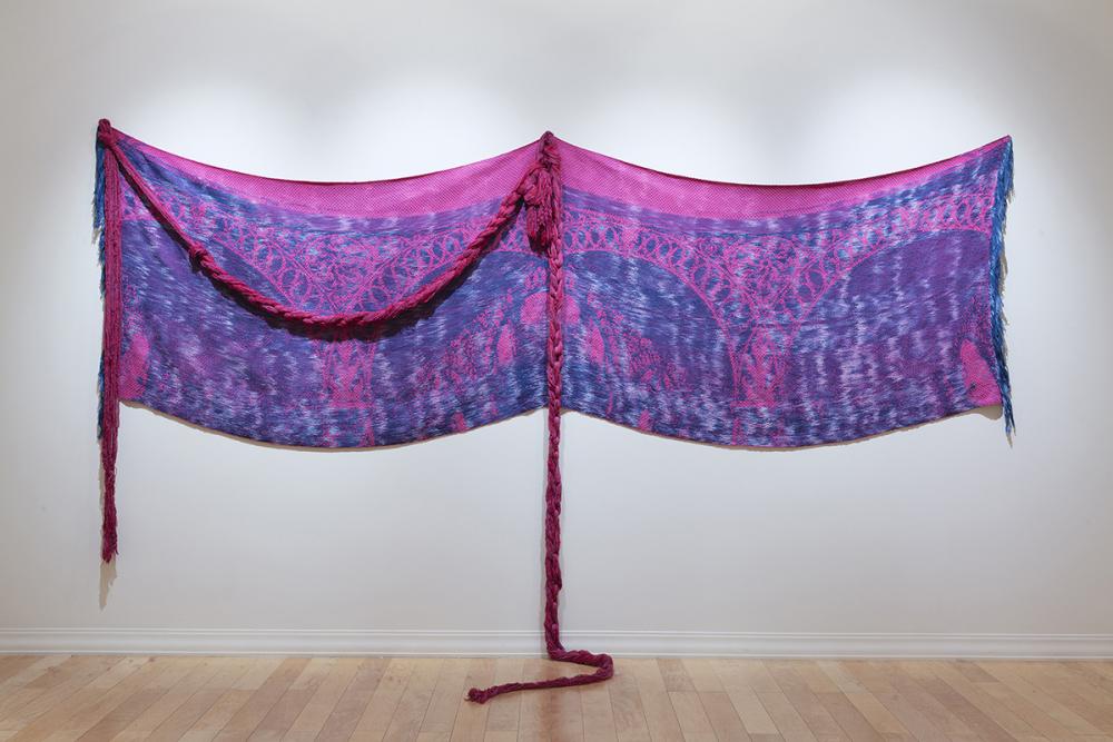 Rose Pavilion, 2022. Chemically and naturally dyed cotton and linen yarn, hand woven on Thread Controller 2 (TC2) digital Jacquard loom, and hand chained rope, 40” x 150”. 