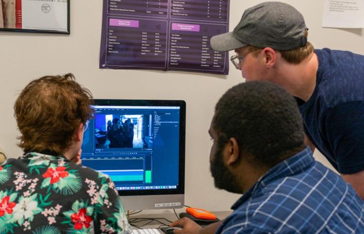 A photo of Visual Studies students collaborating togetherd