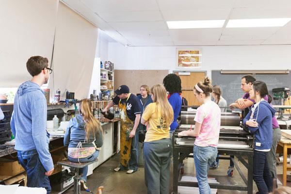 Group of students making a print