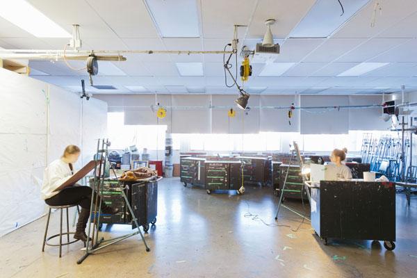 people painting in a studio