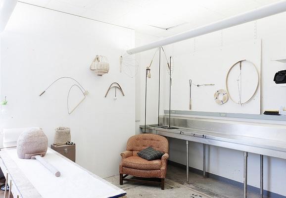 studio with sink, chair and worktable