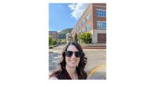 Dr. Brittany Rancour in front of building at Morehead State